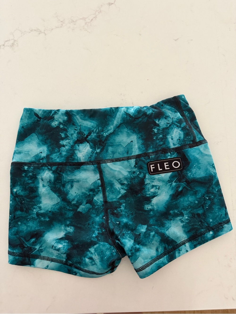 FLEO Women’s Teal Marble Mid Rise Shorts